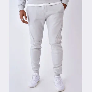 Pantalon-patch-gris-clair_jpg_32c6eec5-ef9a-4975-a033-c94c72943aa4.jpgv1709833116 Bas de jogging technique - Light stone